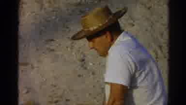 Silver Lake California (1966): A Man Wearing White Shirt And Brown Hat Sitting And