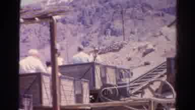 Silver Lake California (1966): Riding A Cart Up A Mountain With Workers On It