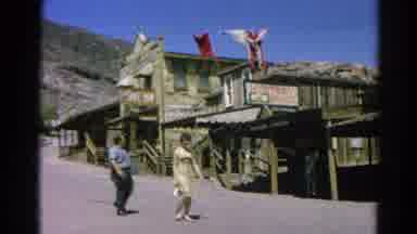 Silver Lake California (1966): A Man And Woman Walk Down The Street Next To Some