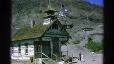 Silver Lake California (1966): Mother And Boy Walk On The Sand Near An Abandoned