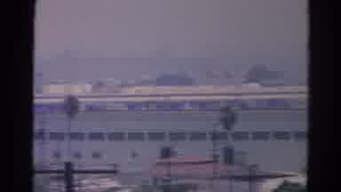 Silver Lake California (1966): Scrolling Video Of Buildings Zoomed In Water Towers