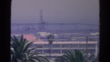 Silver Lake California (1966): A Long Panning Shot Of A Pier Power Lines And Palm