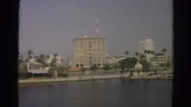 Silver Lake California (1966): Large Building Near The Water Cuts Away To A Water
