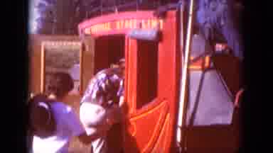 South Dakota USA (1966): Two Boys Enter A Red Stagecoach While Driver Waits In