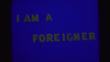 Brazil (1967): Blue Screen Showing A Yellow Text Says I'm A Foreigner