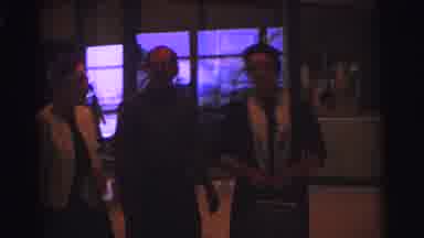 Brazil (1967): Two Women And 1 Men Are Walking Inside A Building With Large Glass