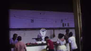 Brazil (1967): A Scene Of Some People Getting Food At A Market