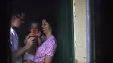 Brazil (1967): Father Entering Home And Seeing Wife And Daughter Playing With Fan