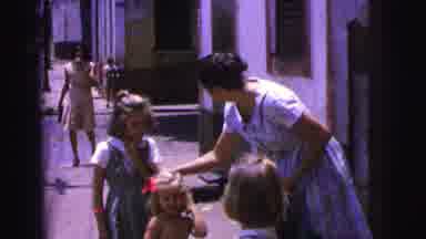 Brazil (1967): Woman Standing On Sidewalk With Three Young Girls Cuts To Same