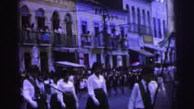Brazil (1967): People Marching In The Parade Look Solemn As The Go By