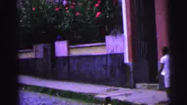Brazil (1967): A Boy And Then A Man In A Suit Walk Across The Street And Down A