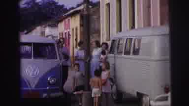 BRAZIL-1967: Family With VW Vans And Men Discussing On Street