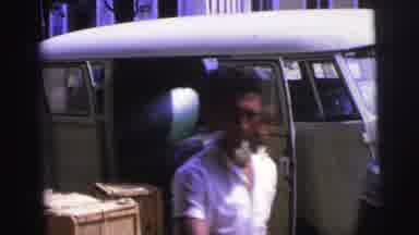 Brazil (1967): Two People Unloading Crates From Van Men And Women Walking By