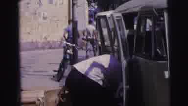 Brazil (1967): Old Footage Young Man Packing Boxes White Kombi In The Street
