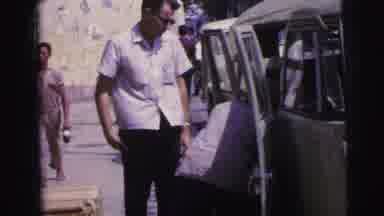 Brazil (1967): Two Men Putting Luggage In A Van
