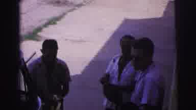 Brazil (1967): Old Video Of Three People Talking In The Shade As One Of Them Wipes