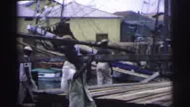 Brazil (1967): Men In A Lumber Yard Working And Carrying Wood