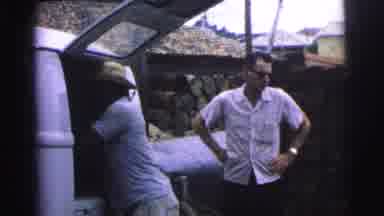 Brazil (1967): Man With Hat Unloading Vehicle Of Wooden Box And Placing It On A