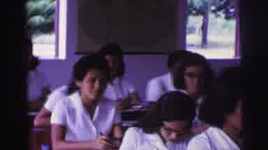 Brazil (1967): A Scene Of People Inside School And Someone Mixing Food
