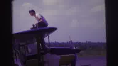 Brazil (1967): Several Men Gathered On A Small Boat On Deck Repairing And Checking