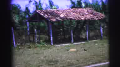 Brazil (1967): 1960s Countryside Footage Of A Large Green Field Near A Abandoned