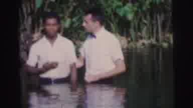 Brazil-1967: Two Men in River During Baptismal Ritual
