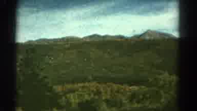 Colorado US (1967): A View Of Mountains And A Valley Taken From A Moving Train