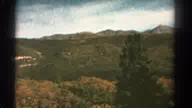 Colorado US (1967): A Tall Mountain With Trees And Lots Of Them Cloud Clear