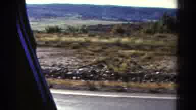 Colorado US (1967): Driving On A Highway Seeing A Desert