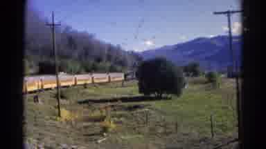 Colorado USA (1967): Passenger Train Traveling Through The Mountains