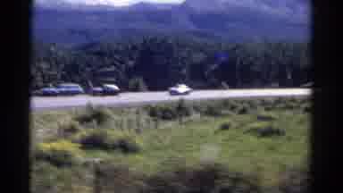 Colorado USA (1967): A Car Is Moving Through A Hilly Road As Seen From A Moving