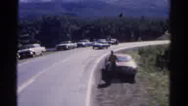 Colorado USA (1967): View From Train Of Cars And People Watching Train Crossing;