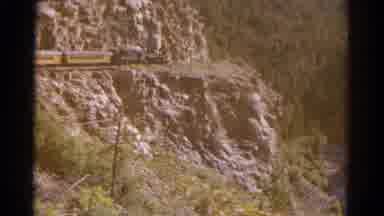 Colorado USA (1967): A Train Going Across The Side Of A Mountain Turning