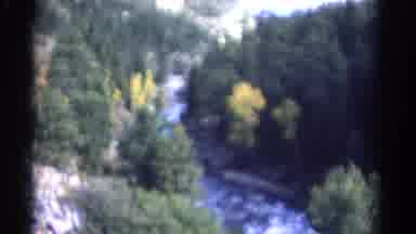 Colorado USA (1967): Footage Of River From Above Showing Beautiful Forest And The