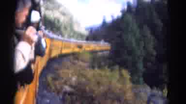 Colorado USA (1967): Train Passes By Railroad With Tourists Photographing The