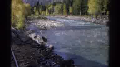 Colorado USA (1967): A River Lined With Trees Either Side Filmed From Along A