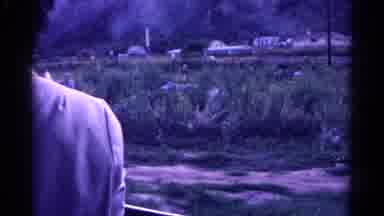 Colorado USA (1967): Person Looking Out The Window Of A Moving Vehicle At A Man On