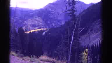 Colorado USA (1967): Mountains Rocky Area And Old Growth Trees With Rolling Hills