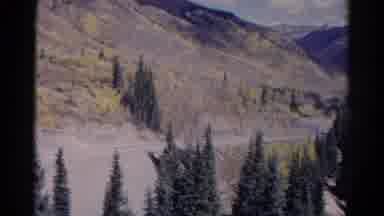 Colorado USA (1967): Traveling On Dirt Road Along A Mountainside Through The A
