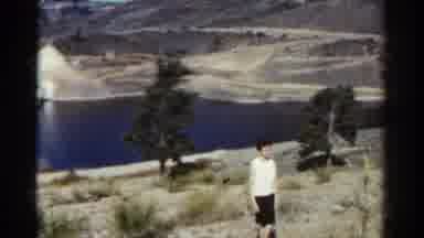 Colorado USA (1967): Old Video Of Young Boy Standing In Front Of A Lake At A Park