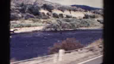 Colorado USA (1967): Footage Of A Scenic Country Drive By A River Filmed From A