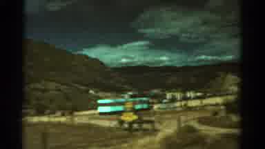 Colorado USA (1967): Camera Showing A Landscape With Mountains And A Village With