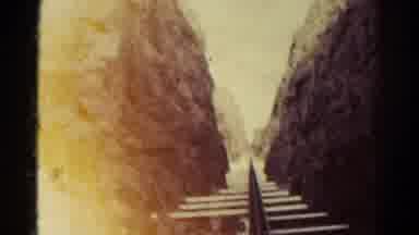 Colorado USA (1967): Something Going Through A Rock And A Steel Bin