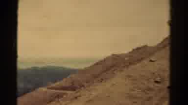 Colorado USA (1967): Man In All Black Standing On Side Of Mountain Recording What