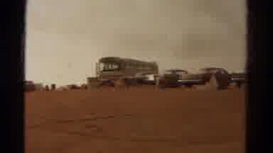 Colorado USA (1967): Many People Stepping Down Bus In A Old Parking Area