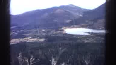 Colorado USA (1967): People Looking Out A Window At The Mountain And Blue Skies