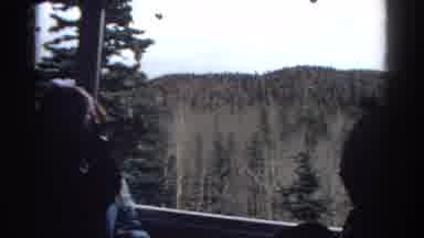 Colorado USA (1967): Tourists Shoot From A Train That Passes Through An Area With