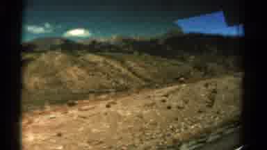 Colorado USA (1967): Looking Through A Car Window At Rocky Rugged Mountains While