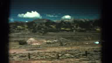 Colorado USA (1967): Drive Through The Countryside Viewing The Mountains And A Red