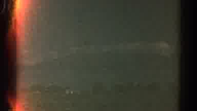 Colorado USA (1967): Faraway View Of A City Across Water Followed By Drive By View